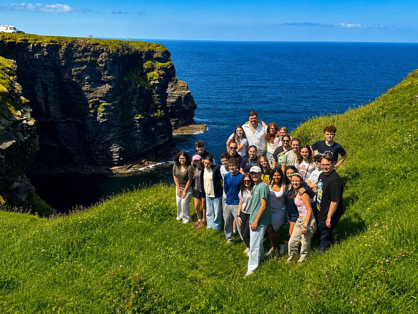ILE students gathered on a clifftop above the Atlantic